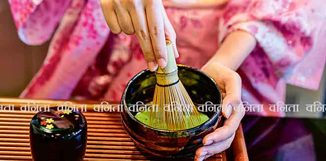 Beautiful woman dress in Kimono traditional Japanese long dress making green tea ,matcha