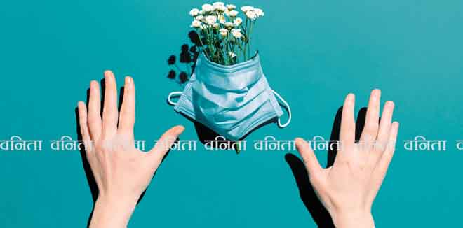 Medical blue mask with flowers. Creative concept of seasonal flu and allergies.