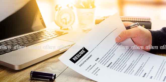 resume-1 Businessman or job seeker review his resume on his desk before send to finding a new job with pen, necktie, glasses and digital tablet.