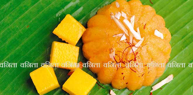451167316 Mango and almond dessert, halwa on banana leaf, Indian dessert