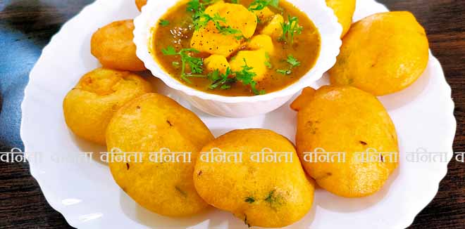 A Jharkhand's famous snack Dhuska with potato curry. street food of Ranchi in the state of Jharkhand, India