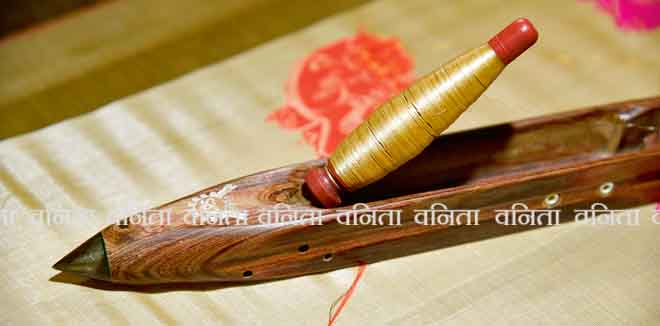 Nagaon, Assam, India. February 11, 2019. Women weaving Assamese silk costumes in a traditional method in a manufacturing unit at Nagaon, Assam. 