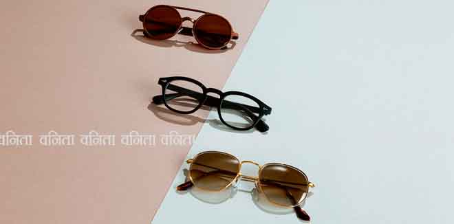 Three pairs of male classic sunglasses and eye glasses on abstract gray and brown paper background. Men eyewear fashion concept.