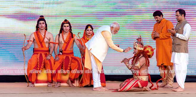 dussehra-1 New Delhi, India- Nov 8 2019: Prime Minister Narendra Modi making sacred mark on hanuman forehead during Dussehra celebrations and rituals , at Dwarka Shri Ramlila Society,