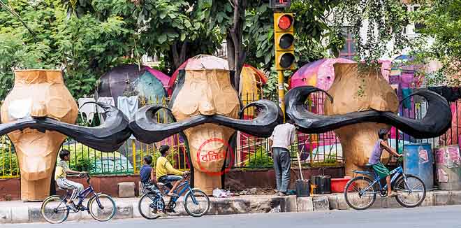 kalakar-2 New Delhi, India - September 29, 2017: Workers making effigy of Ravana on the occasion of Hindu festival of Durga Puja.