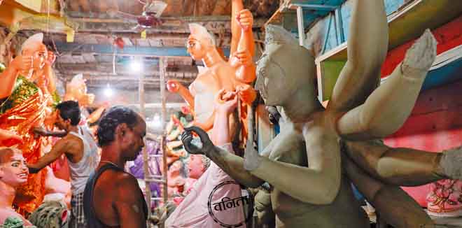 kalakar Kolkata, West Bengal/India- september 20 2019: Artist making idols of maa durga just before durga puja festival